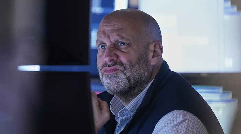 Specialist Meric Greenbaum works on the floor of the New York Stock Exchange, Thursday, Nov. 6, 2025. (AP Photo/Richard Drew)