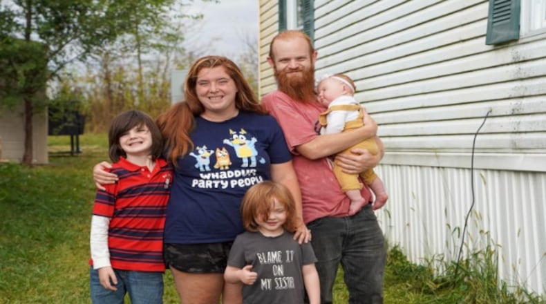 Nikki and Scott of Mechanicsburg with their family. CONTRIBUTED