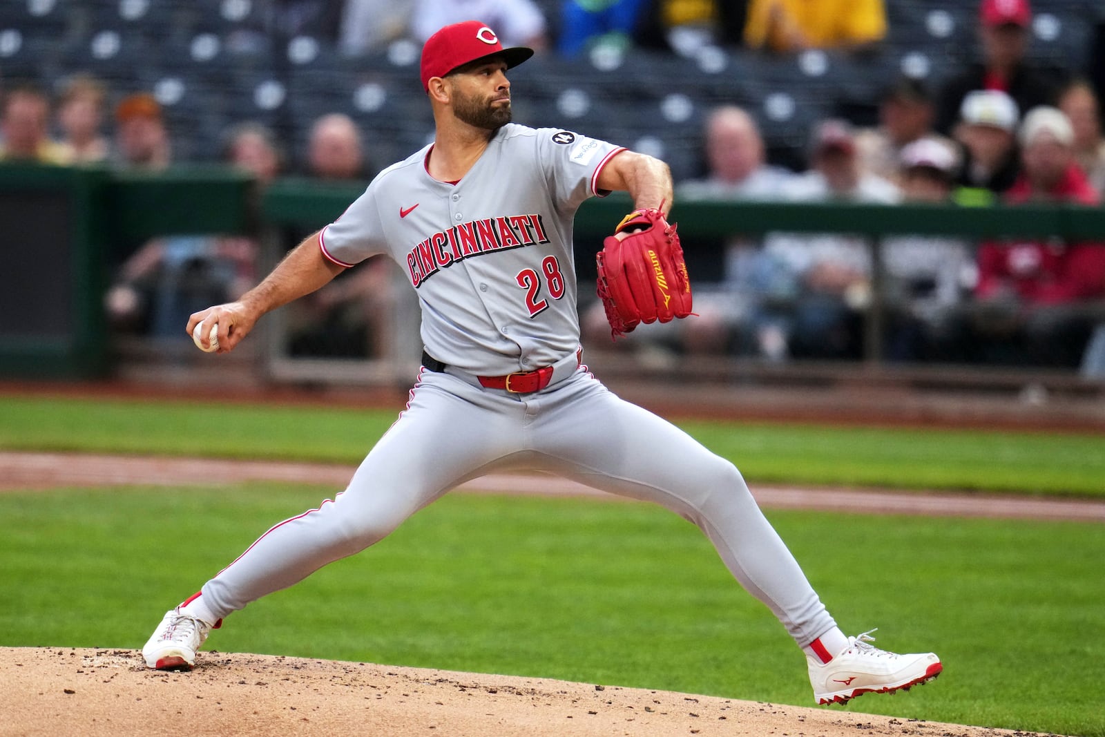 Cincinnati Reds pitcher Nick Martinez delivers during the first inning of a baseball game against the Pittsburgh Pirates in Pittsburgh, Tuesday, May 20, 2025. (AP Photo/Gene J. Puskar)