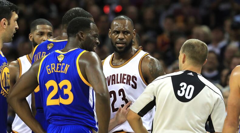 CLEVELAND, OH - JUNE 09: LeBron James #23 of the Cleveland Cavaliers and Kevin Durant #35 of the Golden State Warriors speak after a foul in the third quarter in Game 4 of the 2017 NBA Finals at Quicken Loans Arena on June 9, 2017 in Cleveland, Ohio. NOTE TO USER: User expressly acknowledges and agrees that, by downloading and or using this photograph, User is consenting to the terms and conditions of the Getty Images License Agreement. (Photo by Ronald Martinez/Getty Images)