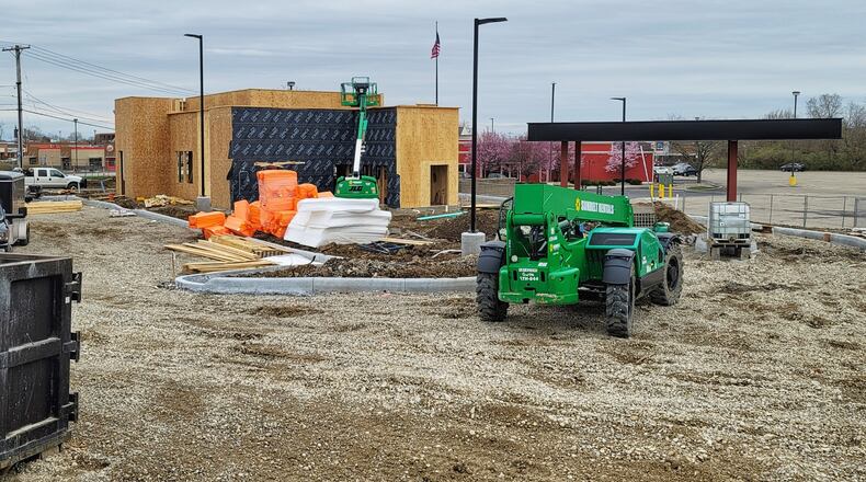 The Raising Cane's restaurant being built on Hamilton's West Side is targeted to open in late June, the company said. NICK GRAHAM/STAFF