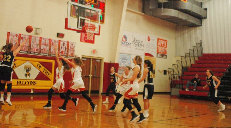 Oakwood’s Kaeley Beam (22) puts up a jumper during Monday night’s 66-50 victory at Fenwick. RICK CASSANO/STAFF