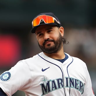 FILE - Seattle Mariners third baseman Eugenio Suarez looks on during a baseball game against the San Diego Padres, Aug. 27, 2025, in Seattle. (AP Photo/Lindsey Wasson, File)