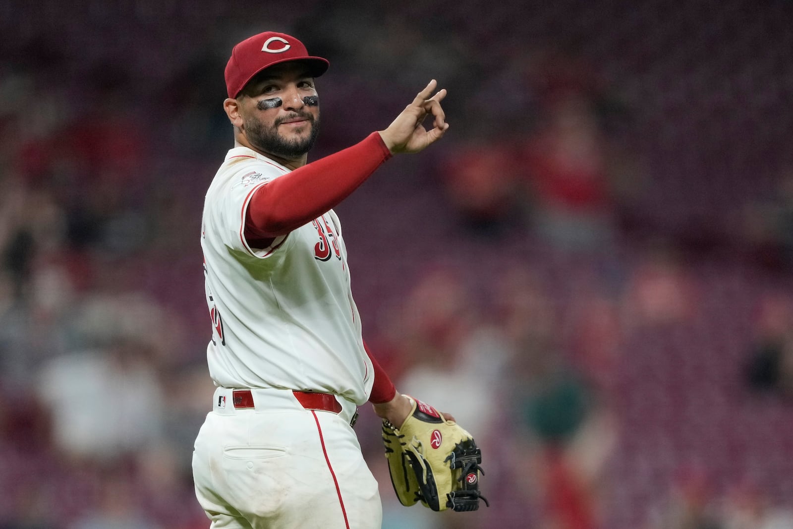 Cincinnati Reds pitcher Jose Trevino signals two outs during the ninth inning of a baseball game against the Miami Marlins in Cincinnati, Tuesday, July 8, 2025. (AP Photo/Carolyn Kaster)