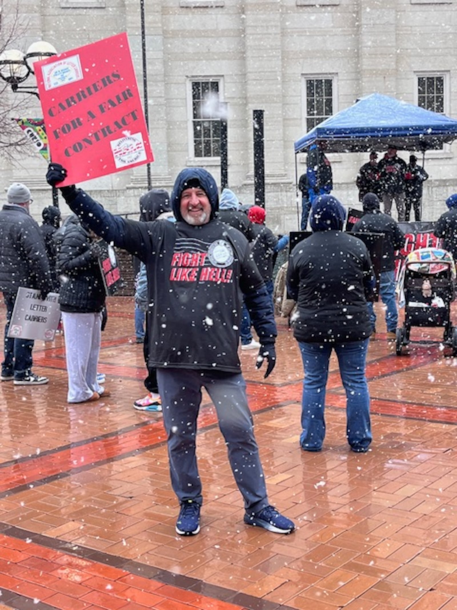 Mail carriers with the National Association of Letter Carriers gathered in downtown Dayton on Sunday to rally for fair contracts. The current NALC contract expires in March and negotiations are set to begin in the coming weeks. CONTRIBUTED