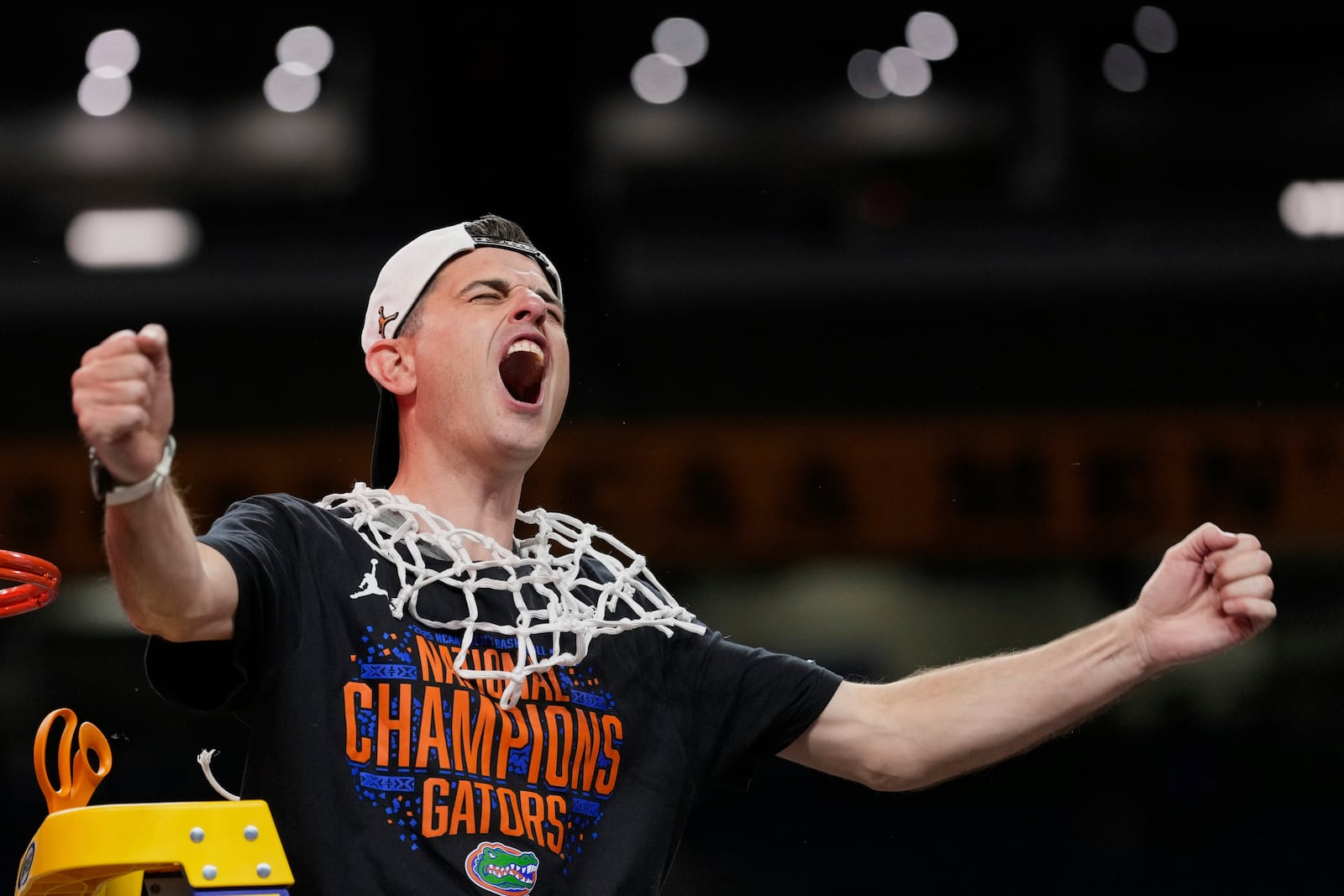 Florida head coach Todd Golden celebrates after Florida beat Houston in the national championship at the Final Four of the NCAA college basketball tournament, Monday, April 7, 2025, in San Antonio. (AP Photo/Eric Gay)