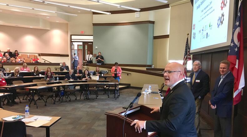 Miami University President Gregory Crawford spoke at Friday's "Workforce Solutions Summit 2019" at the school's Voice Of America (VOA) campus in West Chester Township. Dozens of representatives from area businesses met with Miami's professors and administrators of the school's various business programs to get advice on how to recruit employees in what is a relative tight labor market. The program is the school's latest outreach to partner with area businesses.
(Photo by Michael D. Clark/Journal-News)