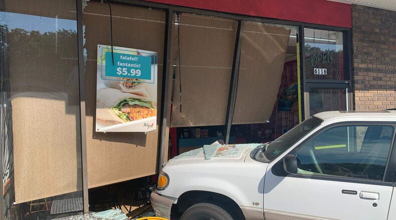 This 2001 white Mercury Mountaineer, driven by Aaron Ferguson, 50, of Fairfield, crashed into Milya Cafe on Winton Road Sunday night. The restaurant hopes to re-open later this week, said owner Bahaa Snoubar. SUBMITTED PHOTO