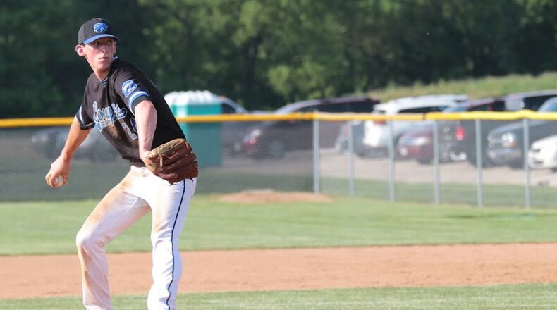 Cincinnati Christian’s Mitchell Smith, shown throwing in last week’s Division IV district final against Tri-County North, will get the mound start for the Cougars on Thursday when they face Russia in a regional semifinal at Carleton Davidson Stadium in Springfield. PHOTO BY KRAE/WWW.KRAEPHOTOGRAPHY.COM