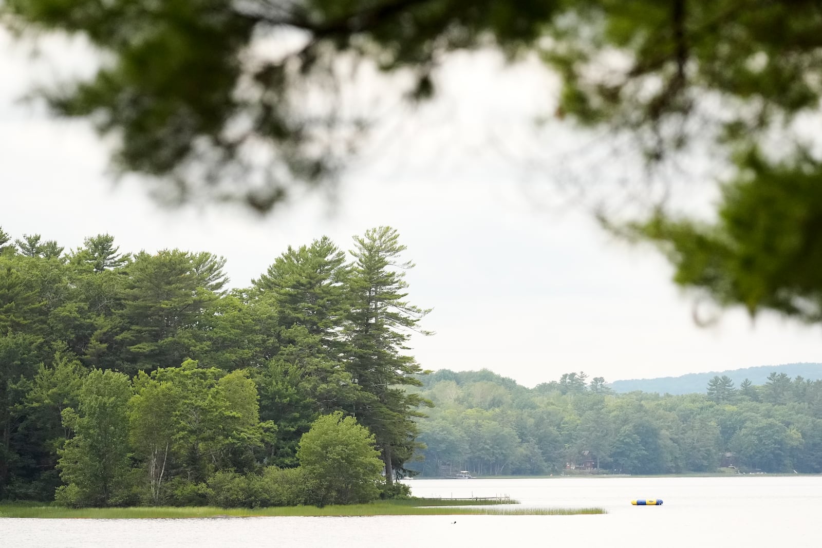 Crawford Pond is seen Wednesday, July 9, 2025, in Union, Maine. Police are investigating the murder of a woman last seen paddleboarding on the pond. (AP Photo/Robert F. Bukaty)