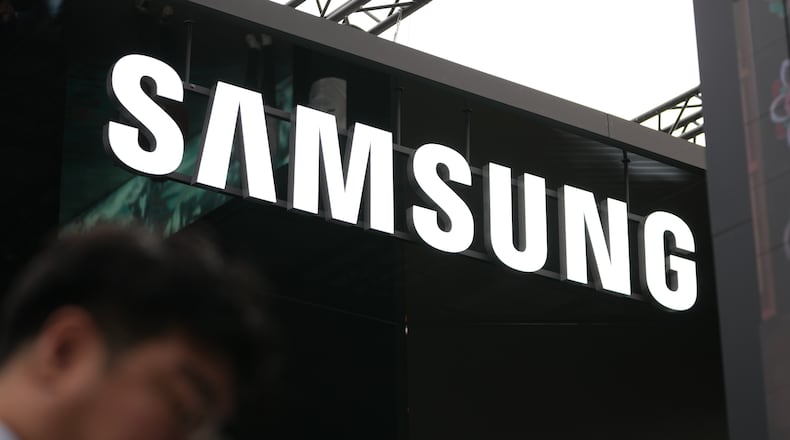 A logo of Samsung Electronics is seen at an exhibition hall for the Asia-Pacific Economic Cooperation (APEC) in Gyeongju, South Korea, Thursday, Oct. 30, 2025. (AP Photo/Lee Jin-man)