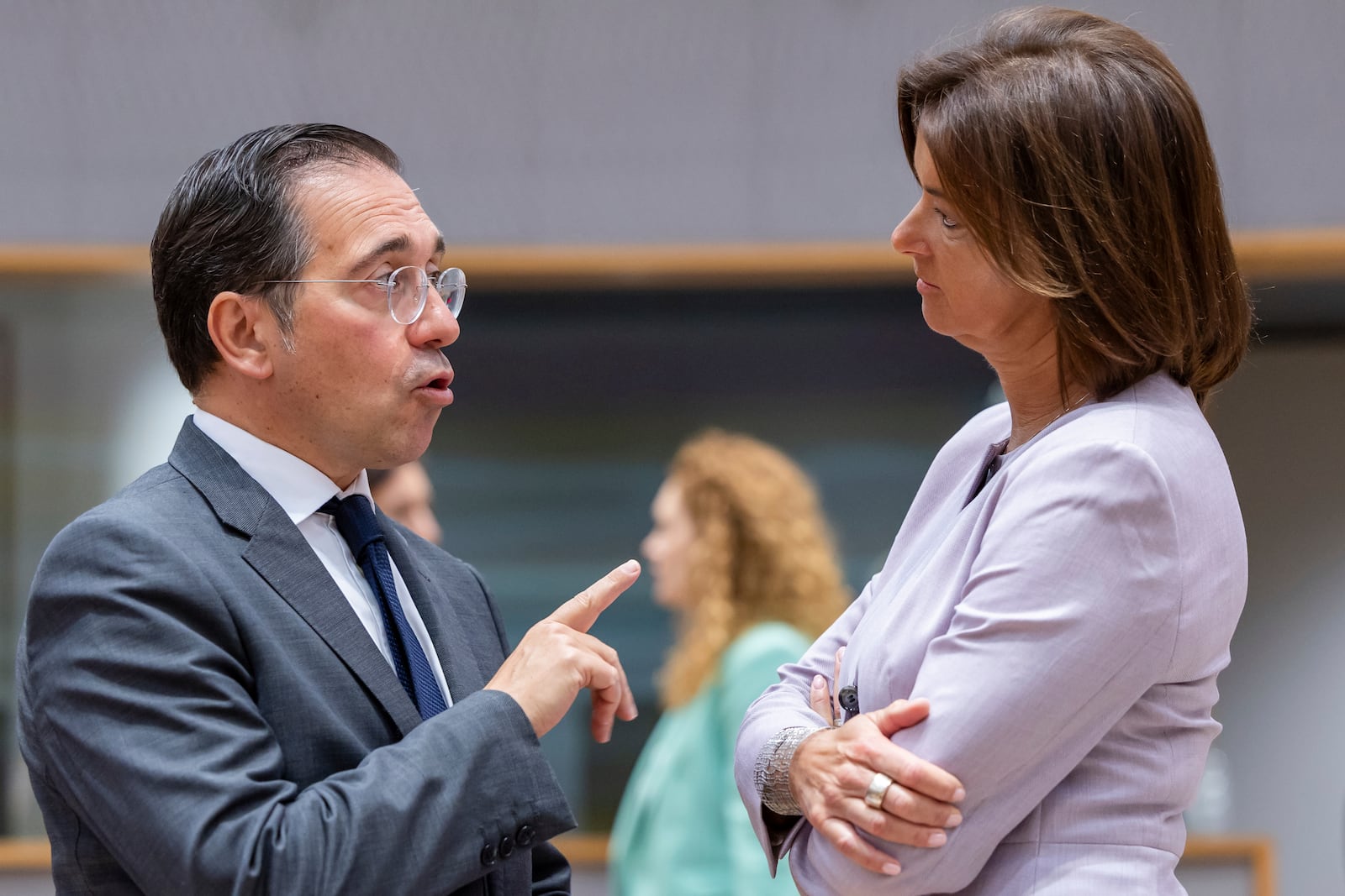 Spain's Foreign Minister Jose Manuel Albares Bueno, left, talks with Slovenia's Foreign Minister Tanja Fajon during the EU foreign ministers meeting at the EU Council building in Brussels, Tuesday, July 15, 2025. (AP Photo/Geert Vanden Wijngaert)
