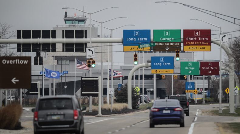 Signs guide drivers near the Dayton International Airport, which will receive money for improvements as part of the infrastructure law.
