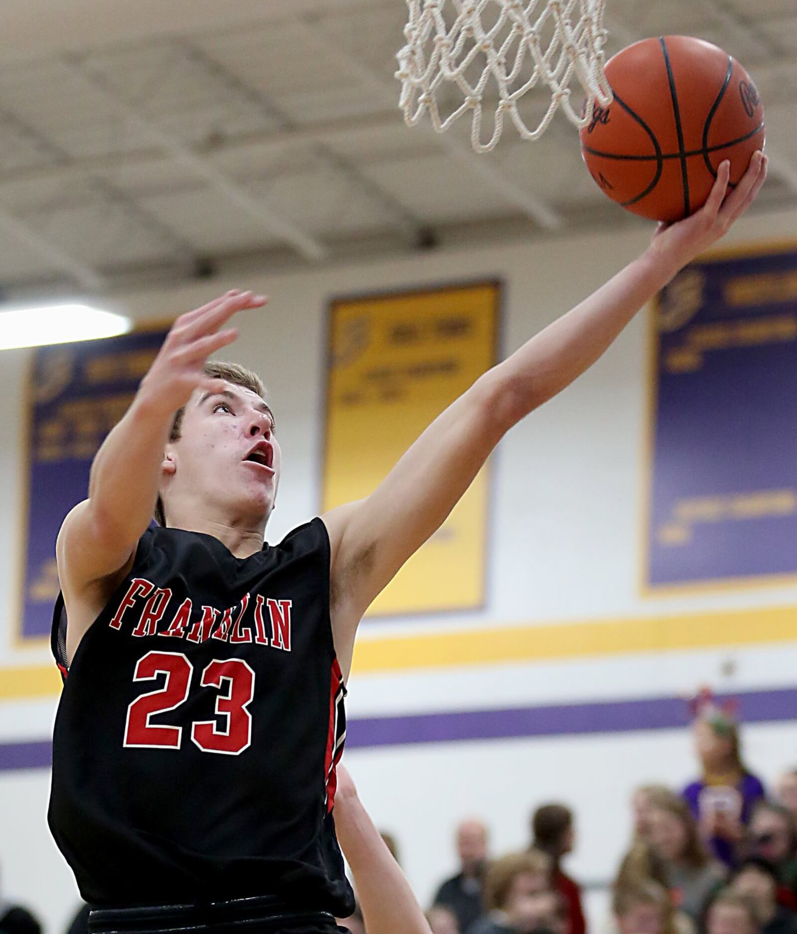 Franklin guard Jared Kinzer goes up for two points Friday night during a game at Bellbrook. CONTRIBUTED PHOTO BY E.L. HUBBARD