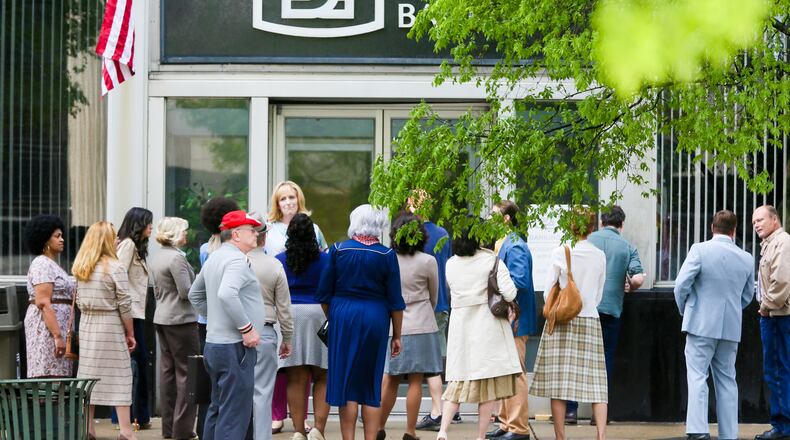 Film crews began filming, Wednesday at the former Fifth Third bank building in Hamilton. GREG LYNCH / STAFF