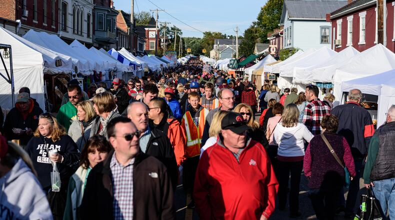 The 49th annual Ohio Sauerkraut Festival took place in downtown Waynesville this weekend on Saturday, Oct. 13 and Sunday, Oct. 14.  The festival combines 60 sauerkraut-related food items with 460 craftspeople from 25 states and attracts over 350,000 people annually. TOM GILLIAM / CONTRIBUTING PHOTOGRAPHER