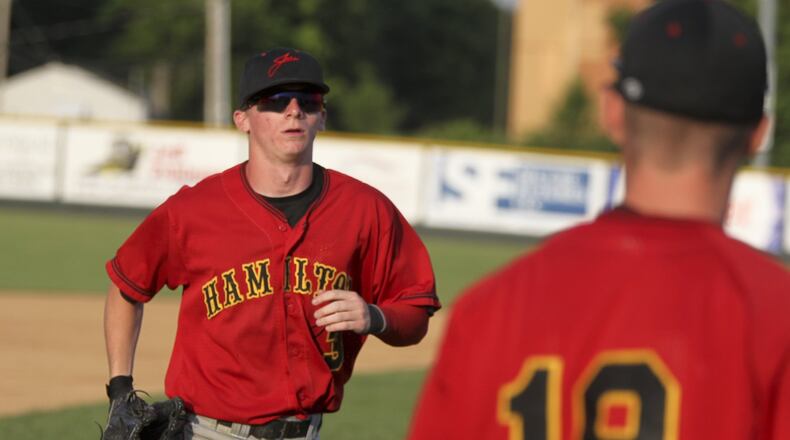 Hamilton Joes center fielder Nate Lynch (3) is greeted at the dugout by Jesse Rait during a game at Foundation Field in Hamilton on June 17, 2014. GREG LYNCH/STAFF