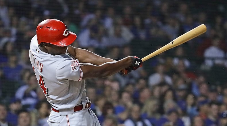 CHICAGO, ILLINOIS - SEPTEMBER 17: Aristides Aquino #44 of the Cincinnati Reds hits a two run home run in the 1st inning against the Chicago Cubs at Wrigley Field on September 17, 2019 in Chicago, Illinois. (Photo by Jonathan Daniel/Getty Images)