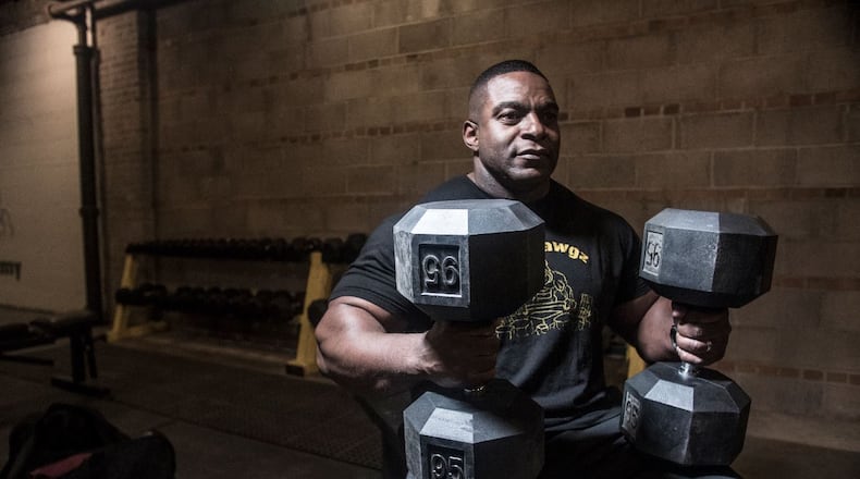 Steve Thompson, owner of Irondawgz Training Academy, works out at the business, which opened in December at 1131 Central Ave. in Middletown. Thompson, a personal trainer and nationally ranked power lifter, said the business offers a combination of conditioning and strength training in 7,000-square feet of space inside Torchlight Pass. (PHOTO: COLLECTIVE NETWORK STUDIO)