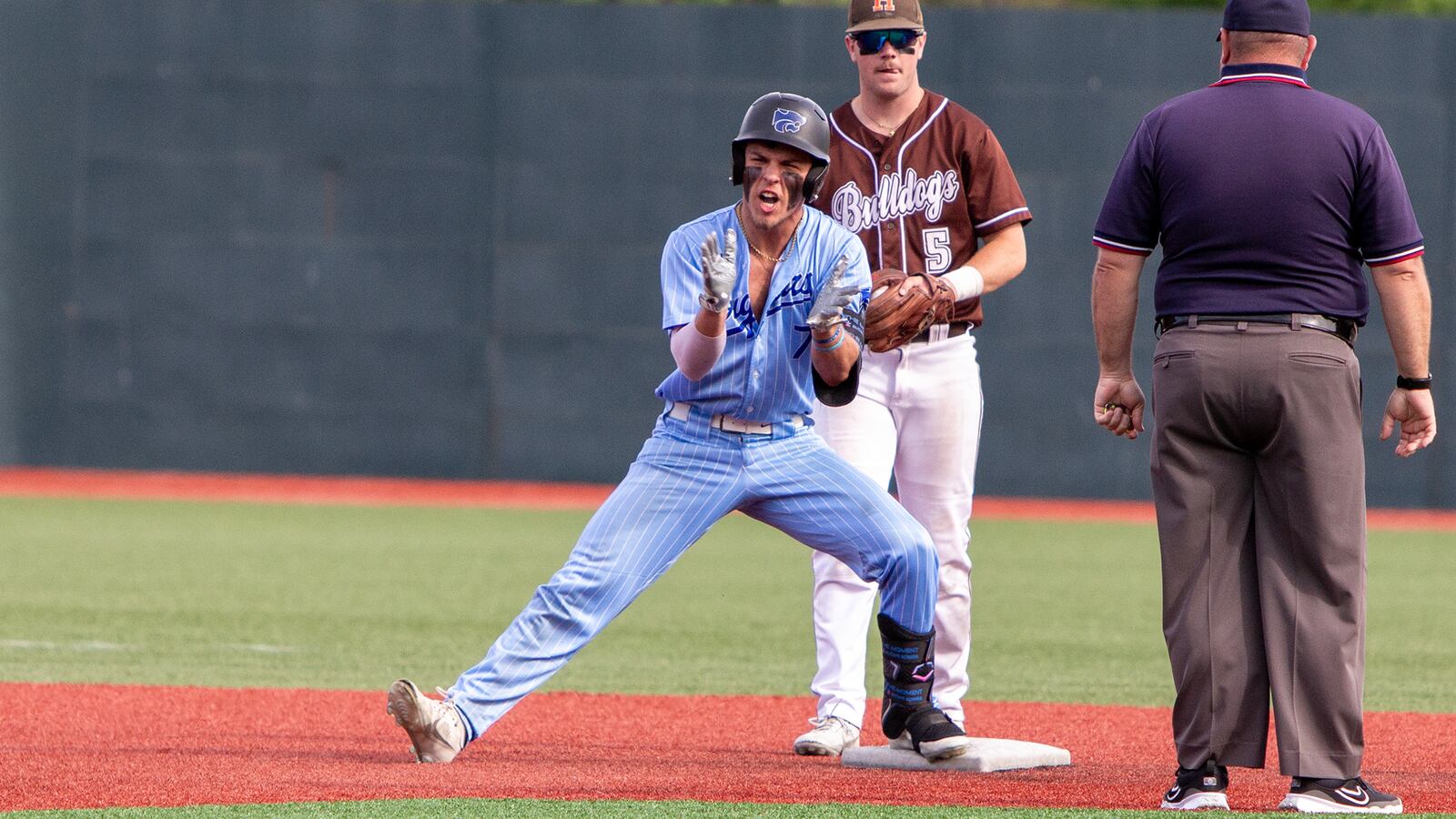 Cincinnati Christian's Timmy Nagel celebrates a double against Heath in Friday's Division III region final loss at Wright State. Jeff Gilbert/CONTRIBUTED