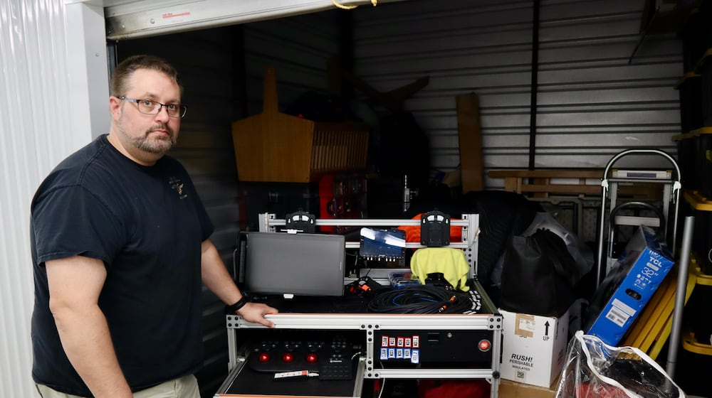 Digital imaging technician Chris Ratledge stands next to his film equipment inside a storage unit in Peachtree City, Ga., Thursday, March 5, 2026. (AP Photo/R.J. Rico)