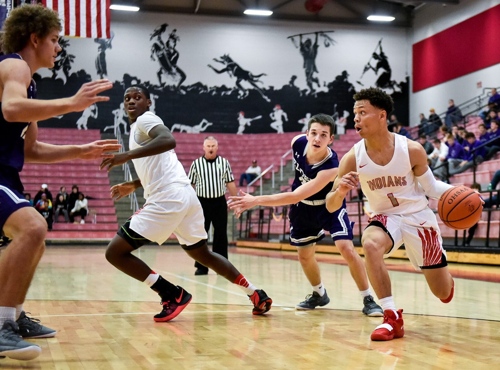 Fairfield’s Zavian Ricks dribbles the ball during Friday night’s 62-55 loss to visiting Elder at the Fairfield Arena. NICK GRAHAM/STAFF