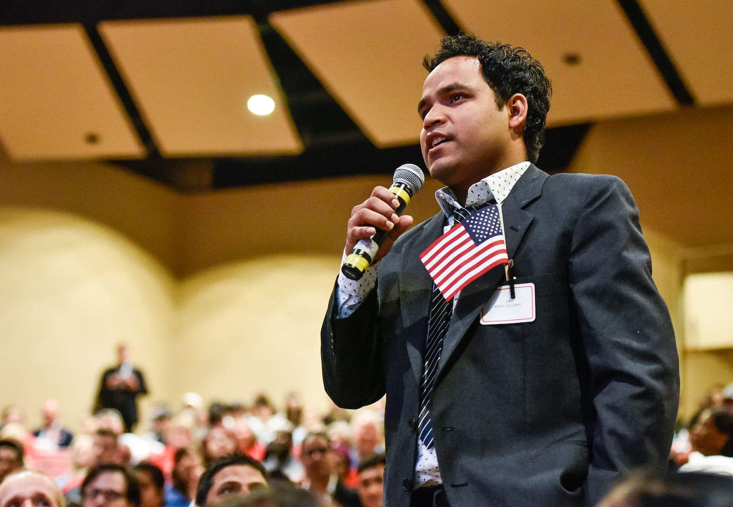 Nearly 100 people become U.S. citizens at naturalization ceremony at Miami Hamilton