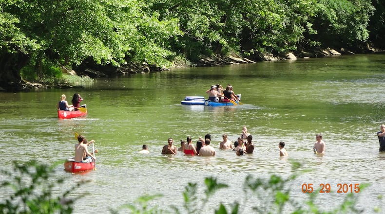 Paddlers traveling down the Little Miami River sometimes stop for a break.