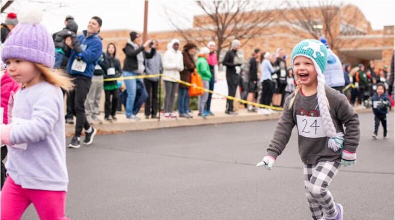 Runners in the Thanksgiving Day 5K fun runs enjoyed themselves on the morning of the holiday. About 100 children ran short races, while others ran 5-kilometer races in Hamilton’s Highland Park neighborhood, in a fundraiser for the YoungLives ministry. PROVIDED