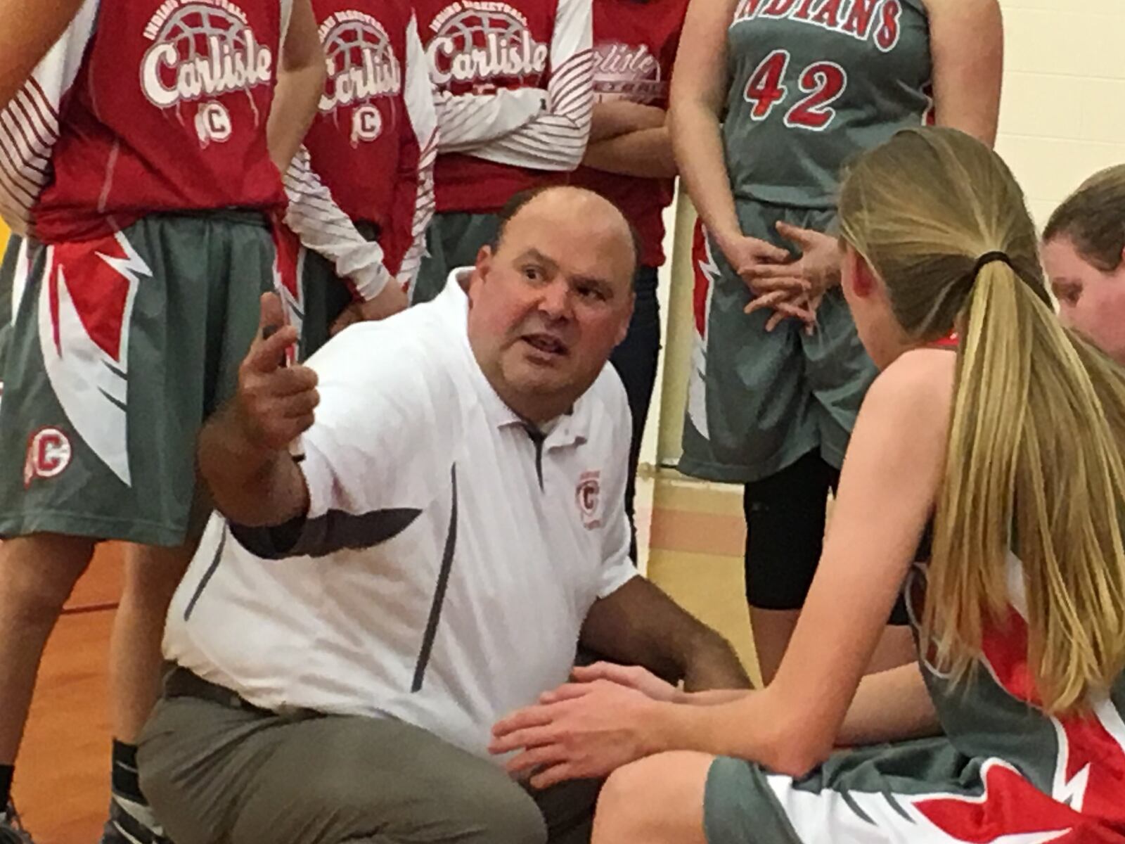 Carlisle coach Randy Glover makes a point to his team during Wednesday night’s game at Fenwick. RICK CASSANO/STAFF