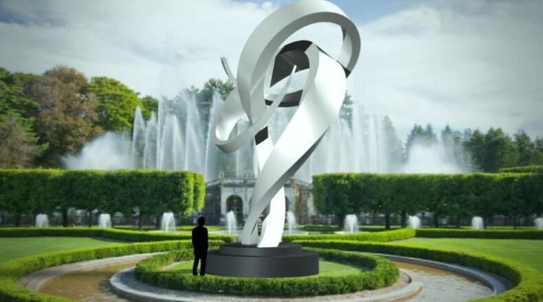 This 25-foot-tall sculpture of brushed stainless steel called Embrace is planned in 2020 for Hamilton’s intersection of Main Street with Millville and Eaton avenues. PROVIDED