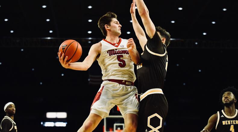 Miami's Peter Suder (5) goes up for a shot against Western Michigan earlier this season at Millett Hall. Jordan Phillips/CONTRIBUTED