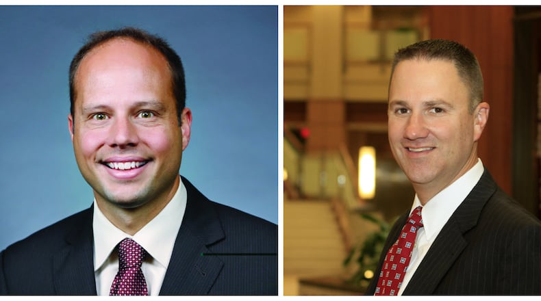 Dr. Keith Bricking (left) will succeed Mike Uhl (right) as president of Atrium Medical Center on Jan. 1. He is the first physician to lead a Premier Health hospital in the system’s 23-year history. CONTRIBUTED