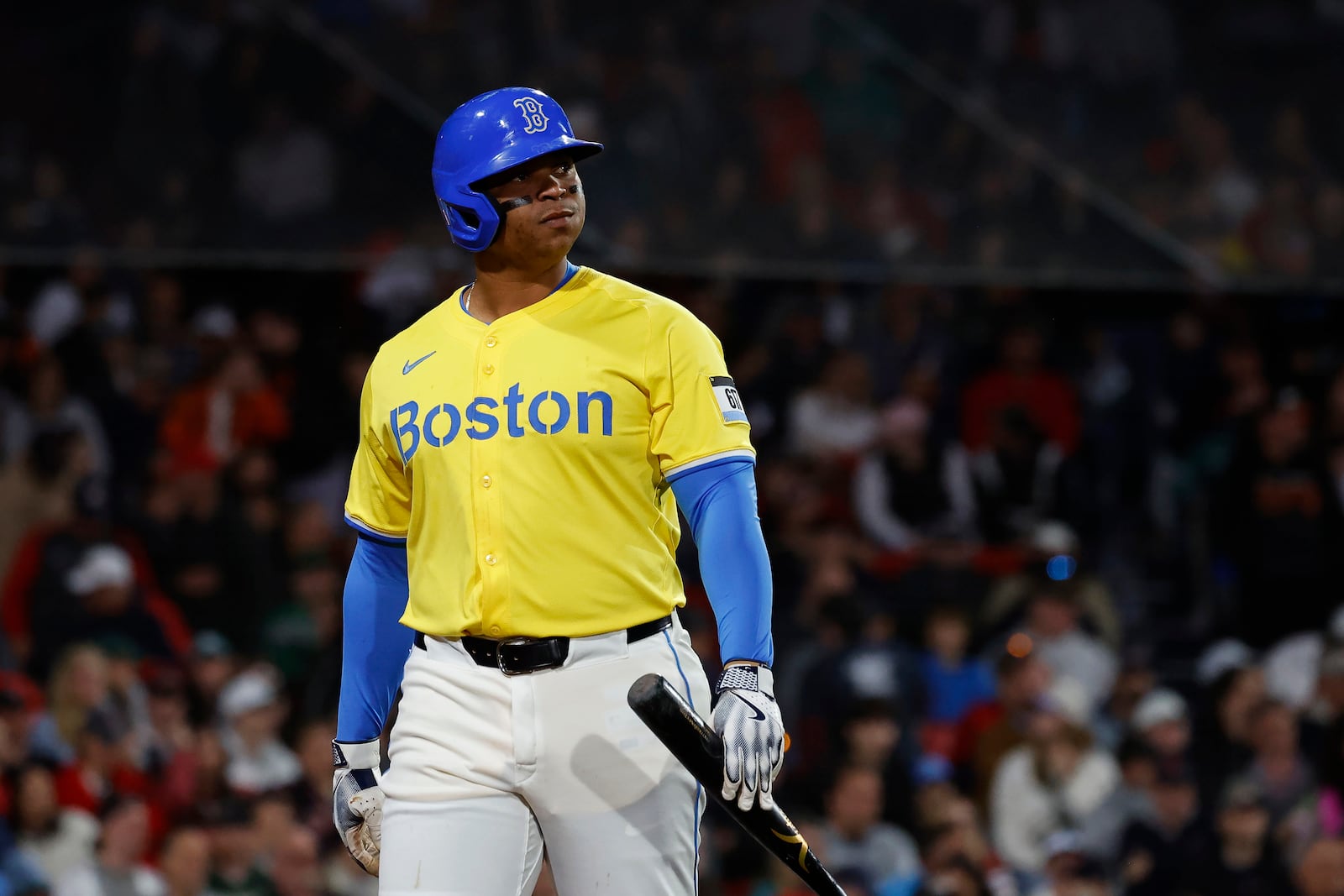Boston Red Sox designated hitter Rafael Devers (11) reacts after popping out during the eighth inning of the second baseball game of a doubleheader against the Baltimore Orioles, Saturday, May 24, 2025, at Fenway Park in Boston. (AP Photo/Mary Schwalm)