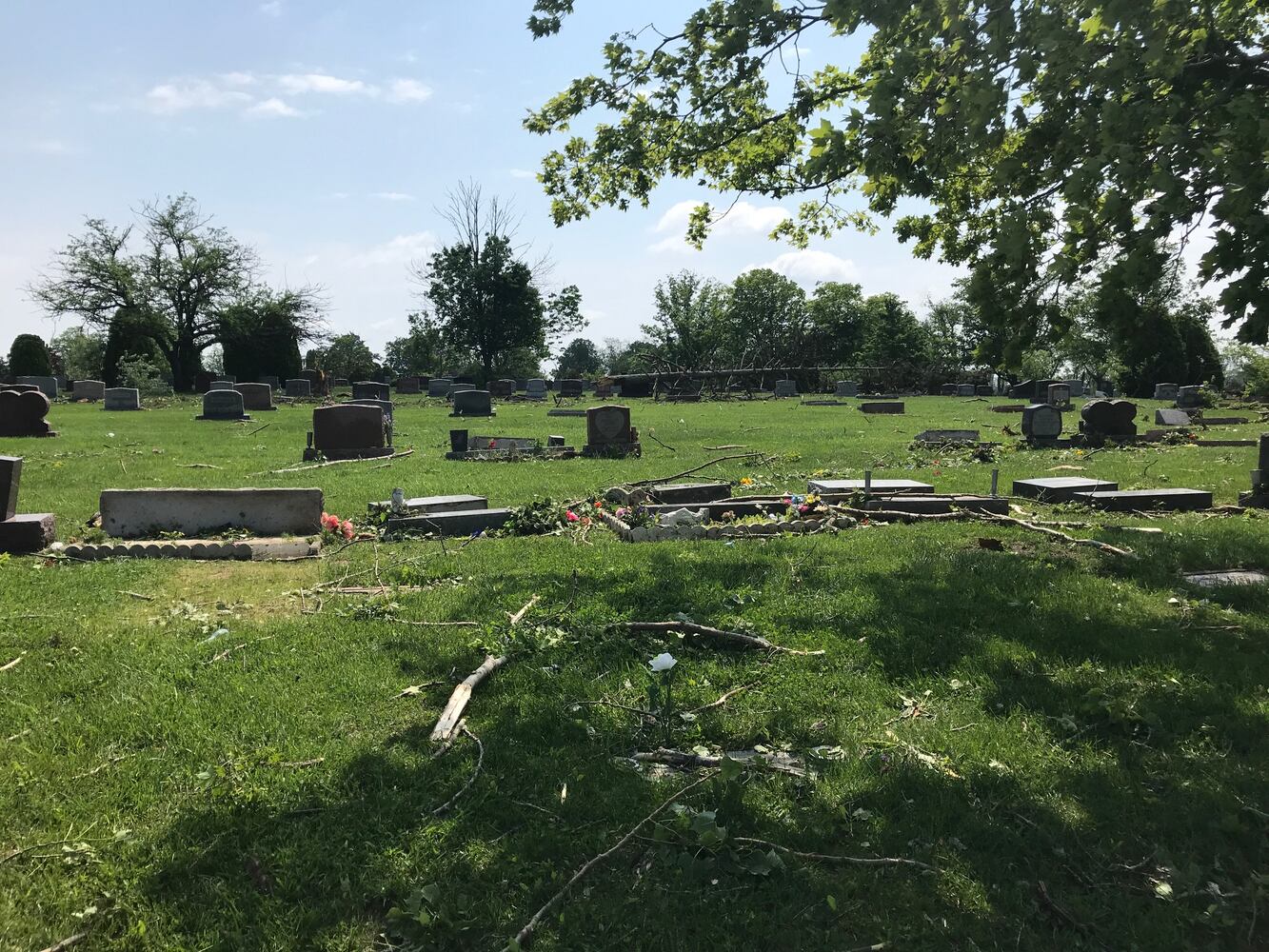 PHOTOS: Tornado-damaged communities dig out, clean up