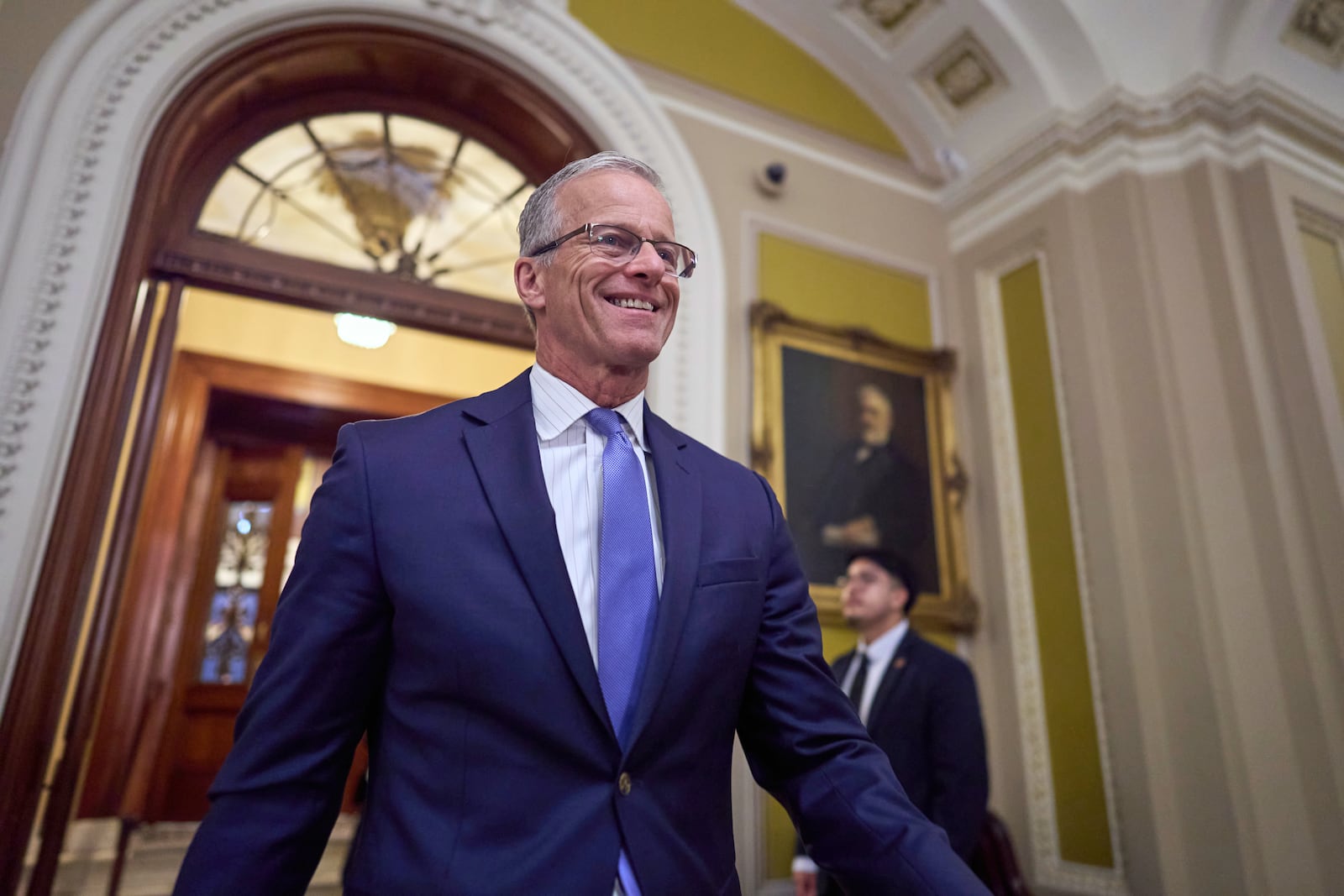 Senate Majority Leader John Thune, R-S.D., leaves the chamber Wednesday afternoon with plans to take up voting on the GOP's sweeping mega bill by next week despite lack of support from key fiscal hawks, at the Capitol in Washington, Wednesday, June 18, 2025. (AP Photo/J. Scott Applewhite)