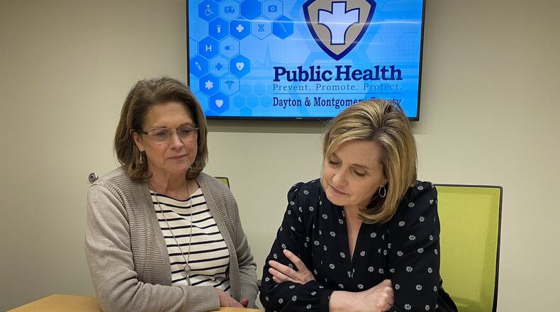 Pictured working in early March, Joyce Close, supervisor, Bureau of Communicable Disease, left, and Mary Proctor, Public Health nurse coordinator, right, are among health workers tracing contacts of people who have the novel coronavirus. CONTRIBUTED