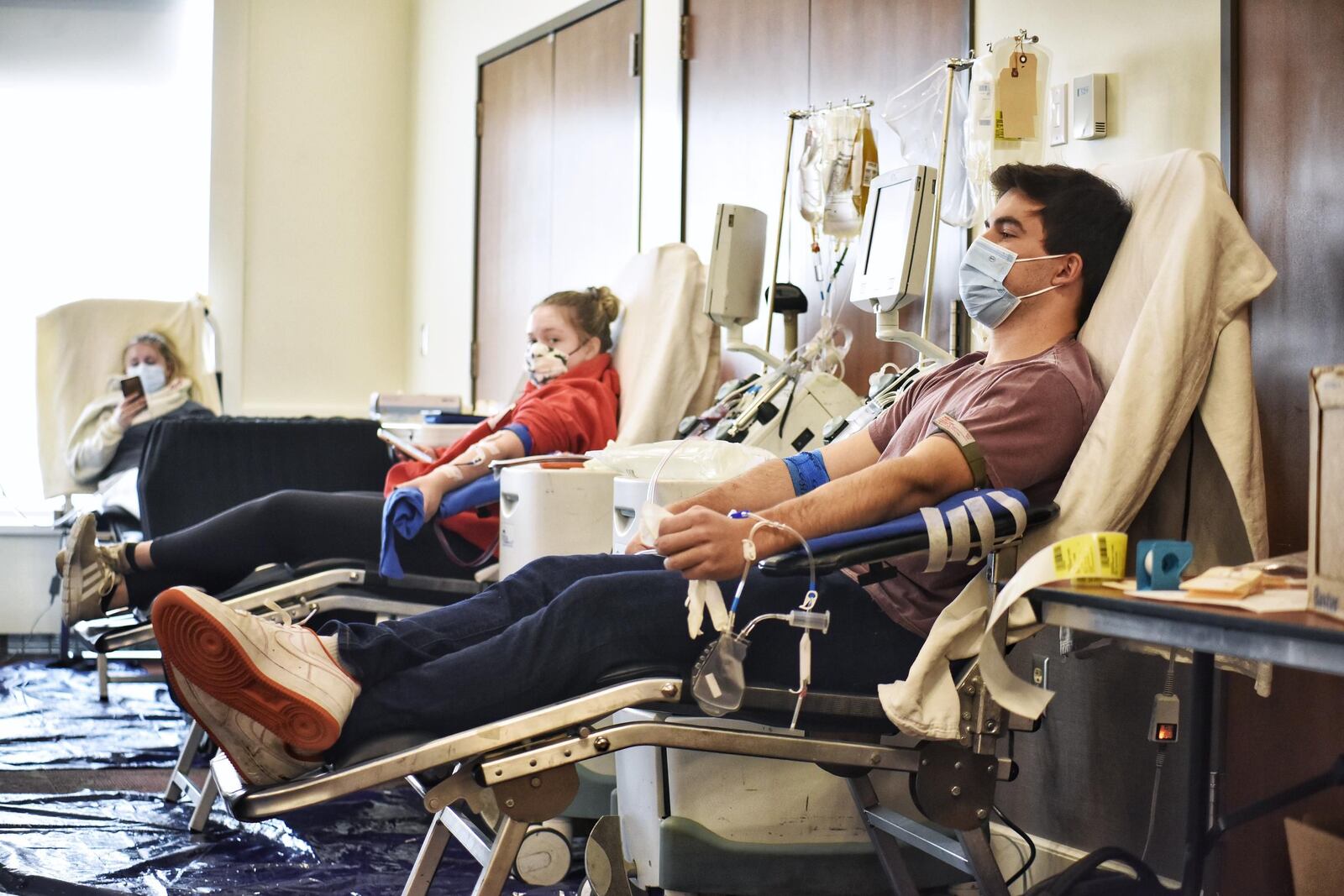 Miami University senior Will Vandeveer donates plasma during a Convalescent Plasma Drive hosted by Hoxworth Blood Center and Miami University on Wednesday, Oct. 28, 2020 at Miami University's Armstrong Student Center in Oxford. NICK GRAHAM / STAFF