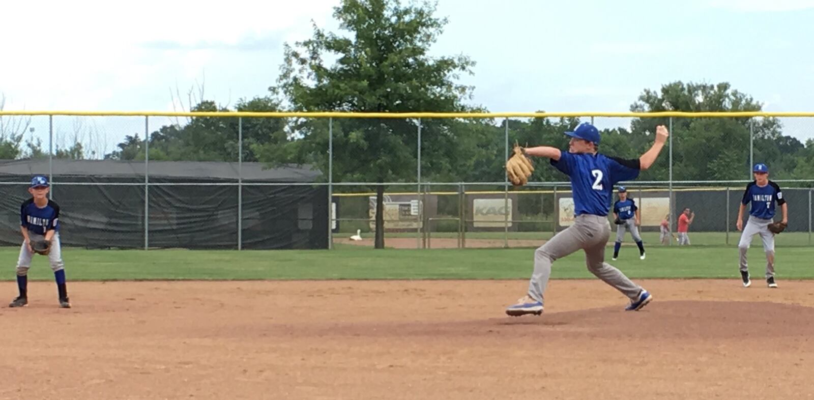 Hamilton West Side’s Jonathan Alcorn is about to fire a pitch toward the plate during Monday night’s Ohio Little League Tournament game against Kenton at the Hoover Community Recreation Complex in North Canton. West Side notched an 11-1 win. RICK CASSANO/STAFF