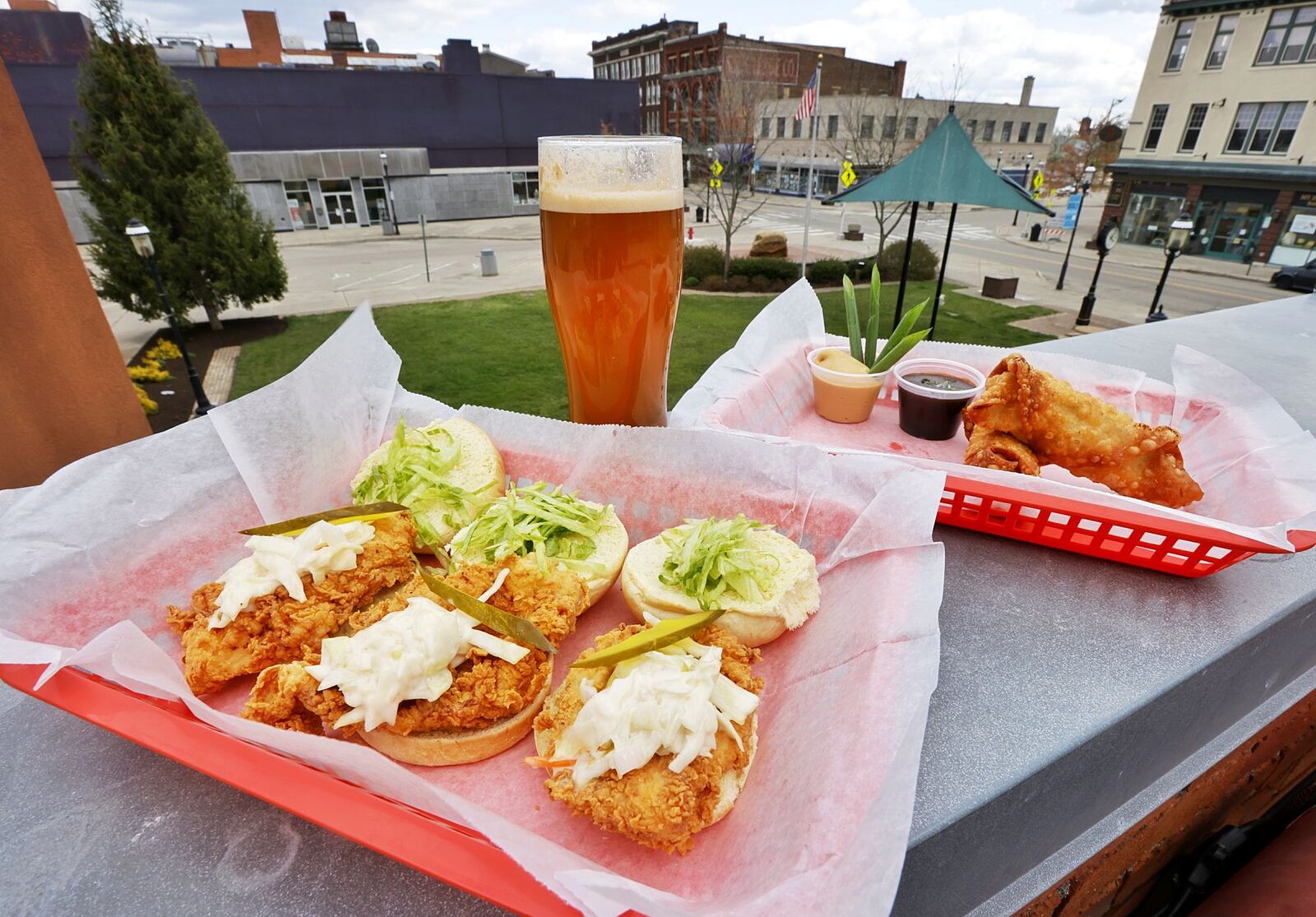 The restaurant @ The Square on Central Avenue in downtown Middletown is renovating their rooftop patio bar and adding new scratch-made food items such as chicken sliders and crab rangoon eggrolls. NICK GRAHAM/STAFF