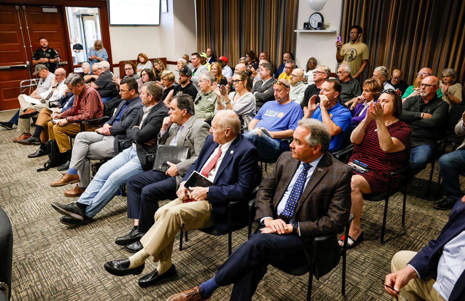 A crowd of about 100 gathered for a special Hamilton city council meeting to discuss the Miami Conservancy District assessment increase Thursday, April 18, 2024 in Hamilton. NICK GRAHAM/STAFF