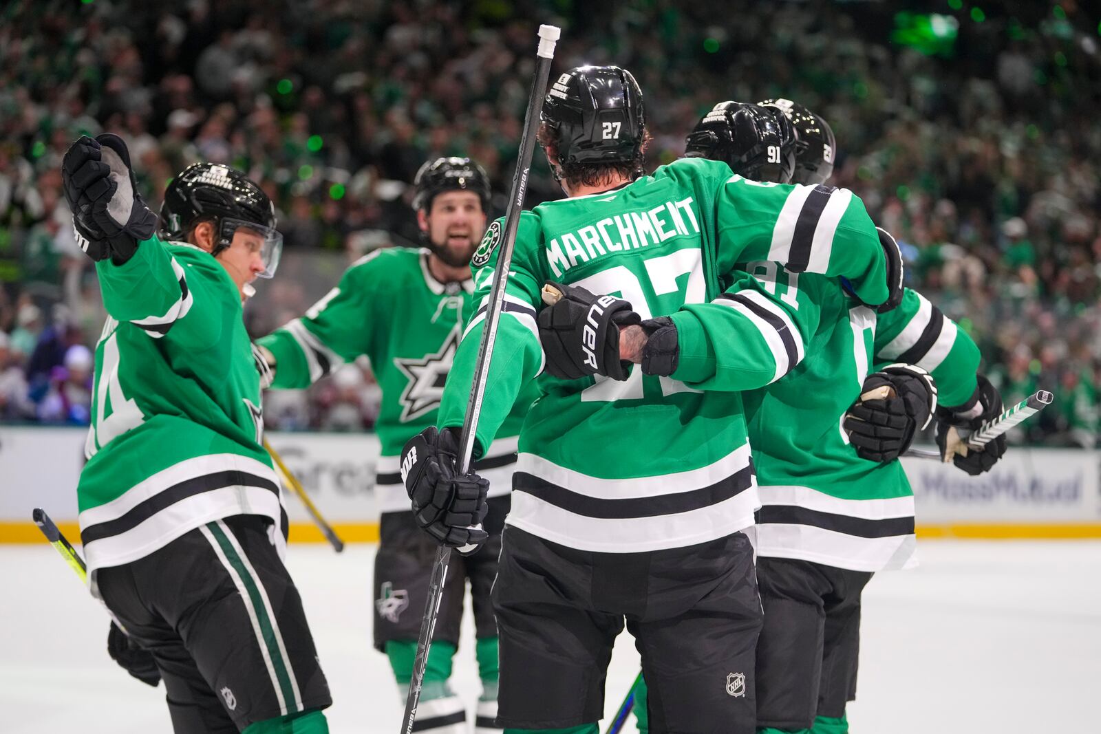 Dallas Stars players celebrate a power play goal by center Tyler Seguin, second from right, during the first period in Game 2 of a first-round NHL hockey playoff series against the Colorado Avalanche Monday, April 21, 2025, in Dallas. (AP Photo/Julio Cortez)