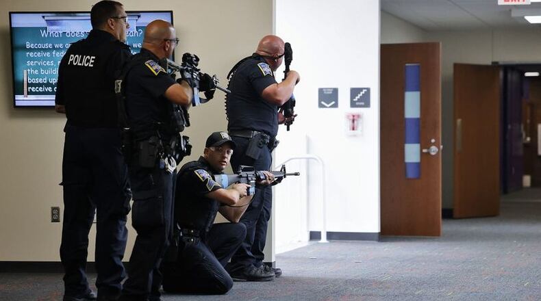 Recent violent threats against area schools and beyond were revealed to be hoaxes but still caused chaos for thousands. The active shooter threats were fake but the costs in lost classroom learning weren’t, say area school officials. Pictured is a recent "active shooter" drill at Middletown High School. NICK GRAHAM/FILE PHOTO