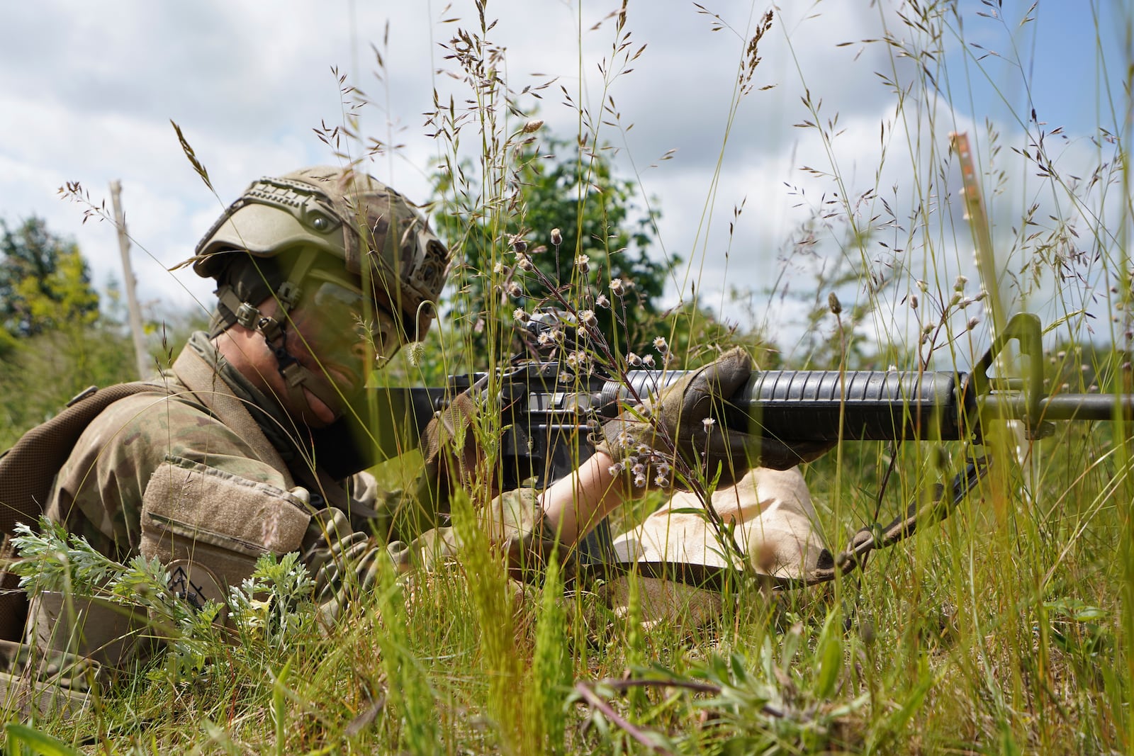 A young conscript aims his rifle during final exercises at a training area close to Royal Danish Army’s barracks in Hovelte, 25 kilometres north of Copenhagen, Denmark, Wednesday, June 11, 2025. (AP Photo/James Brooks)