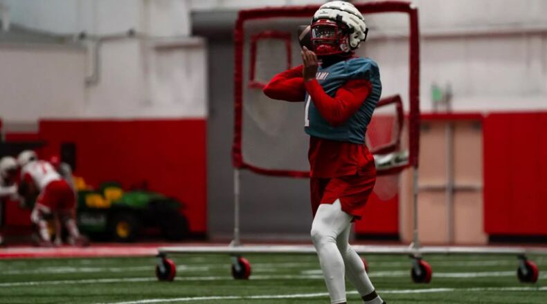 Miami University quarterback Dequan Finn runs through a drill during a recent spring practice. PROVIDED PHOTO