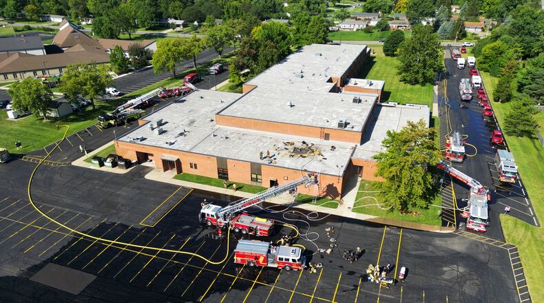Crews from multiple departments were called to a fire at Lakota's Hopewell Junior School Monday, Sept. 4, 2023 on Cox Road in West Chester Township. NICK GRAHAM/STAFF