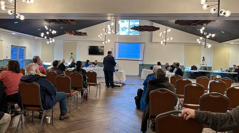 Bob Nolan, a business consultant and tax specialist, made a presentation Saturday at Central Connections. He was part of a task force that looked into possible solutions for the center. RICK McCRABB/STAFF