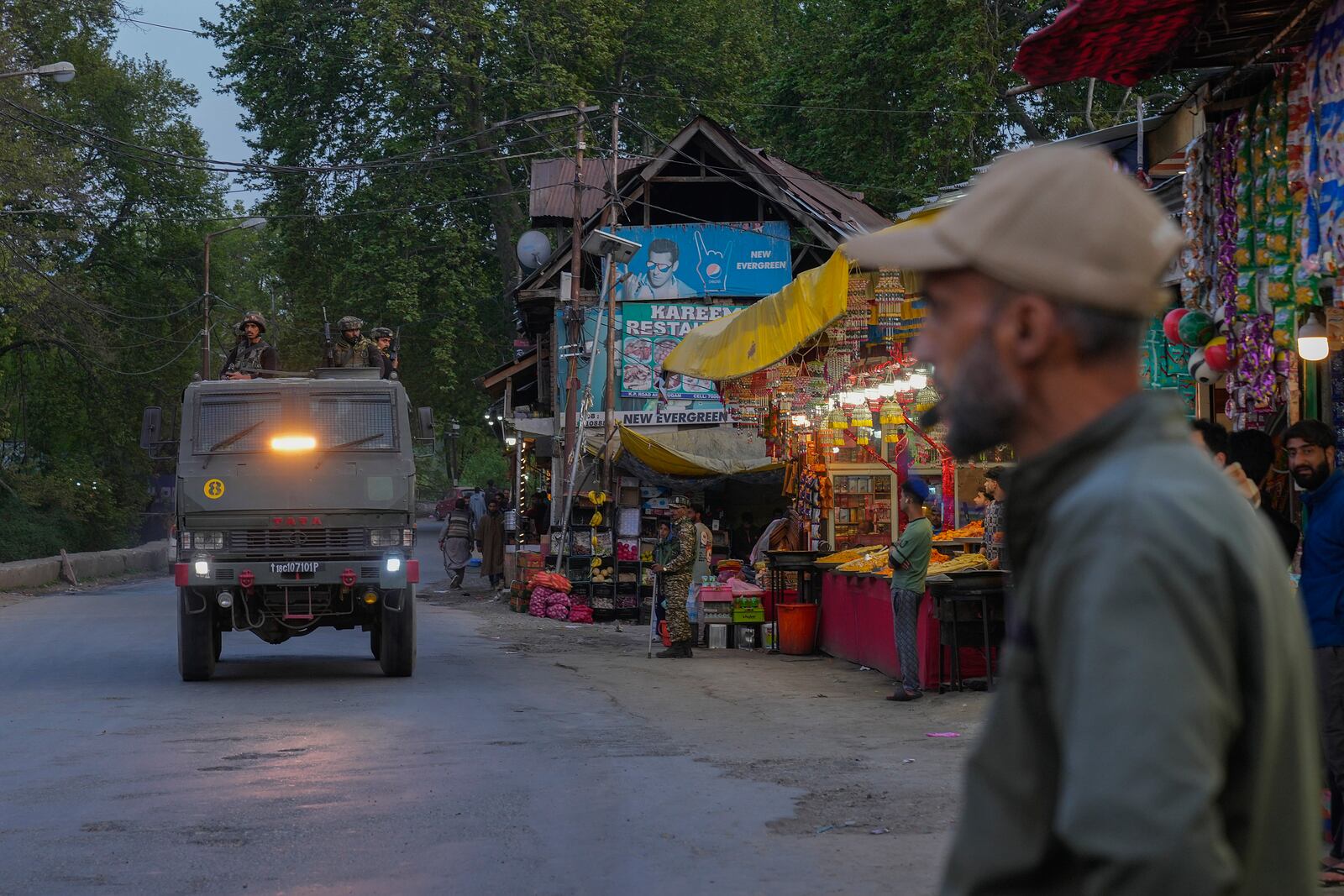 Indian security officers patrol in armored vehicle near Pahalgam in south Kashmir after assailants indiscriminately opened fired at tourists visiting Pahalgam, Indian controlled Kashmir, Tuesday, April 22, 2025.(AP Photo/Dar Yasin)