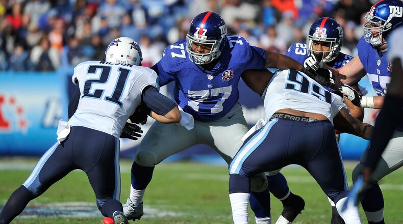 NASHVILLE, TN - DECEMBER 07: John Jerry #77 of the New York Giants plays against the Tennessee Titans at LP Field on December 7, 2014 in Nashville, Tennessee. (Photo by Frederick Breedon/Getty Images)