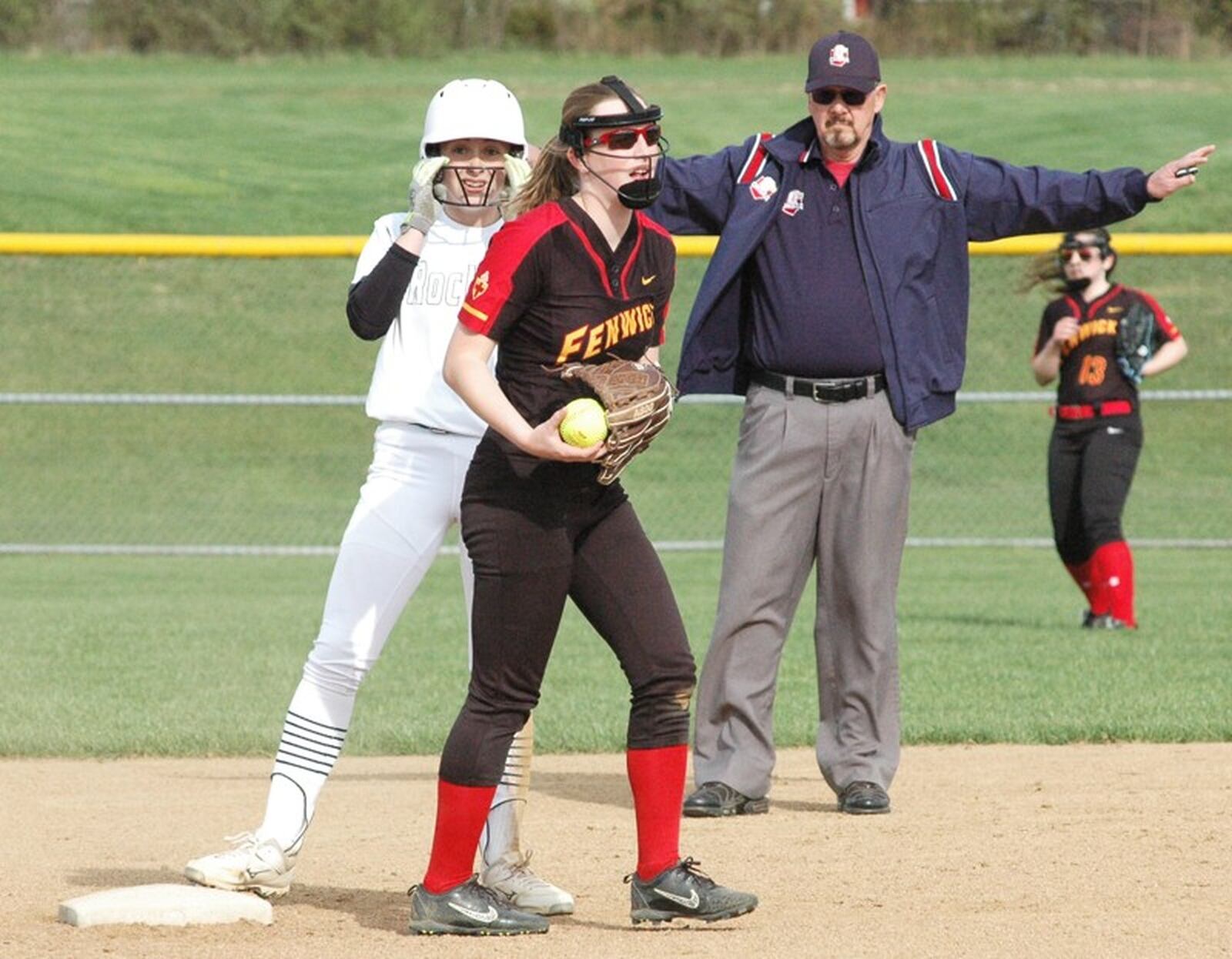 Fenwick shortstop Abby Gustely (8) has the ball as Haven Dwyer of McNicholas is safe at second base April 12 during a Greater Catholic League Coed Division softball game at Fenwick. McNicholas won 11-0. RICK CASSANO/STAFF